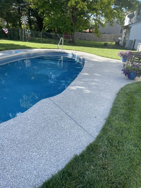 Pool deck treated with SparkleTuff anti-slip floor coating